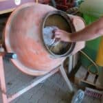 Application of inoculants using a cement mixer is common.